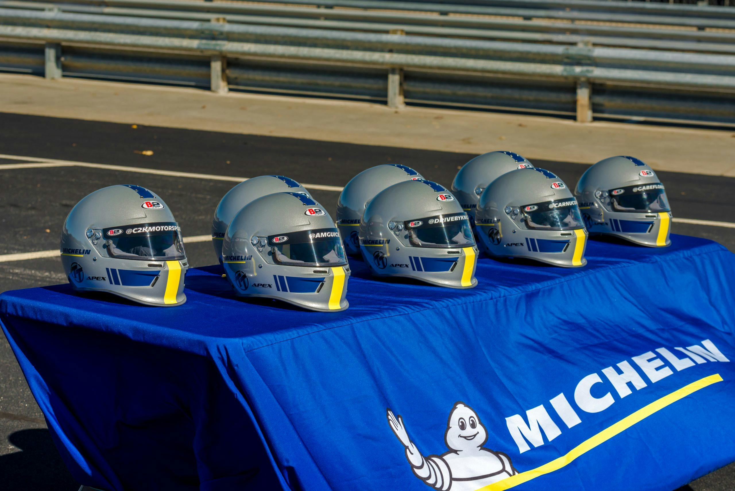 Michelin Petit Le Mans 2021 helmets on table