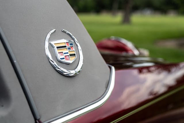 Houston slab car red Cadillac emblem