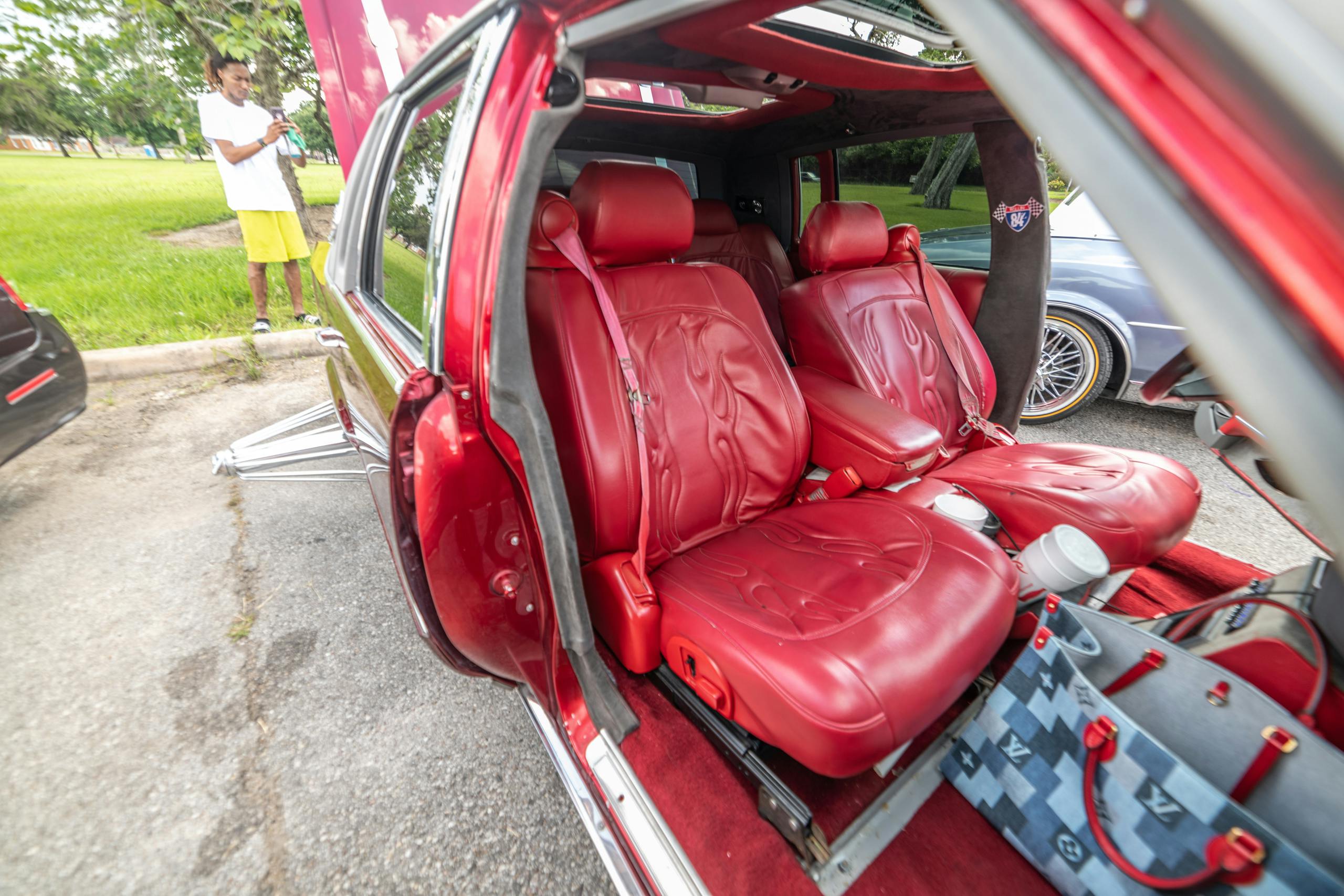 Houston slab car red Cadillac interior