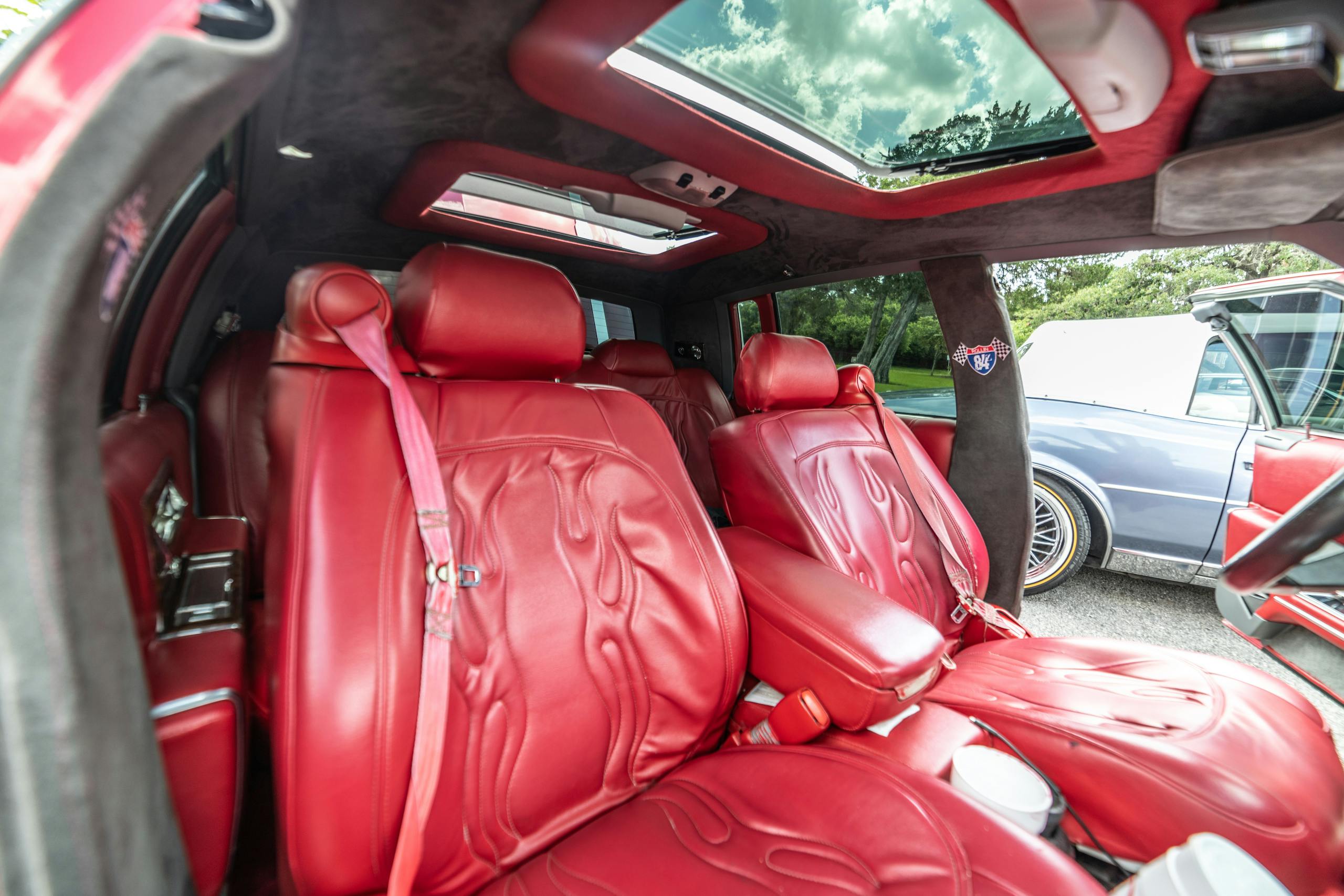 Houston slab car red Cadillac interior