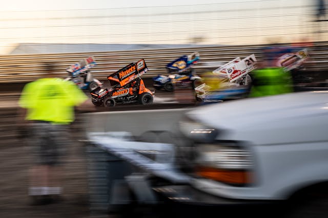 Knoxville Raceway dirt track racing action blur