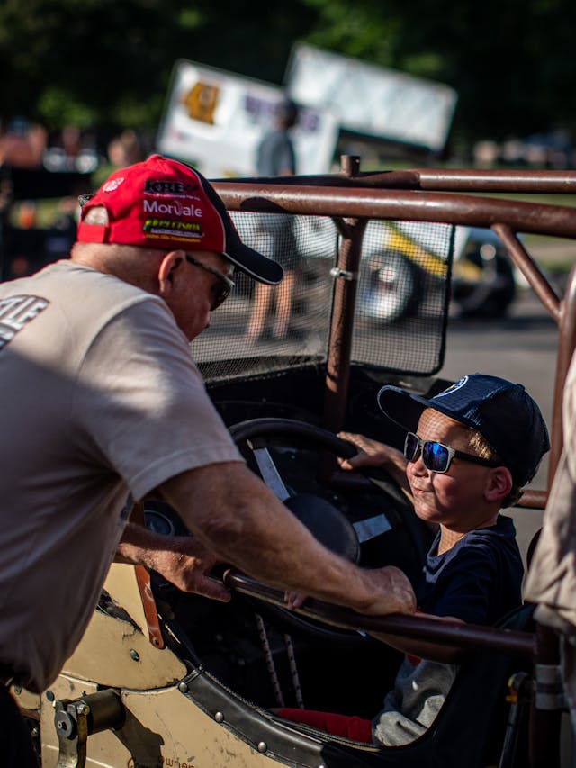 Knoxville Raceway dirt track racing lifestyle kid behind wheel