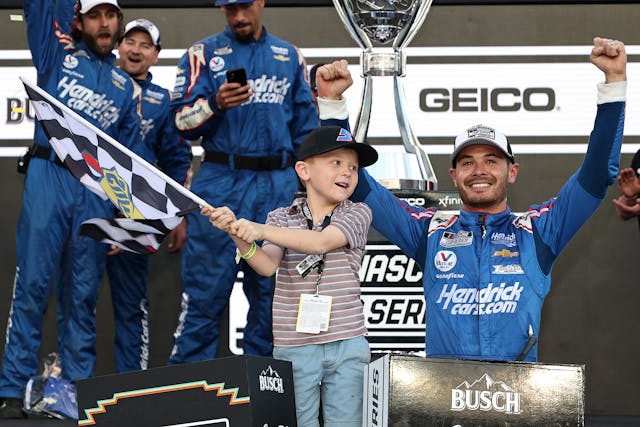 Kyle Larson celebrates with son NASCAR Cup Series Championship