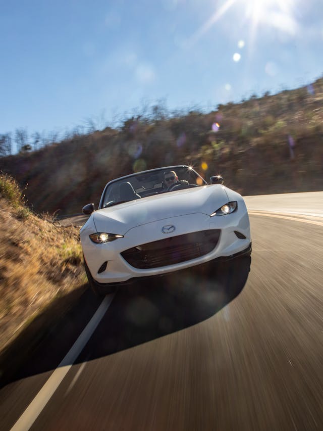 2021 Mazda MX-5 Miata Club Roadster front end driving vertically-oriented