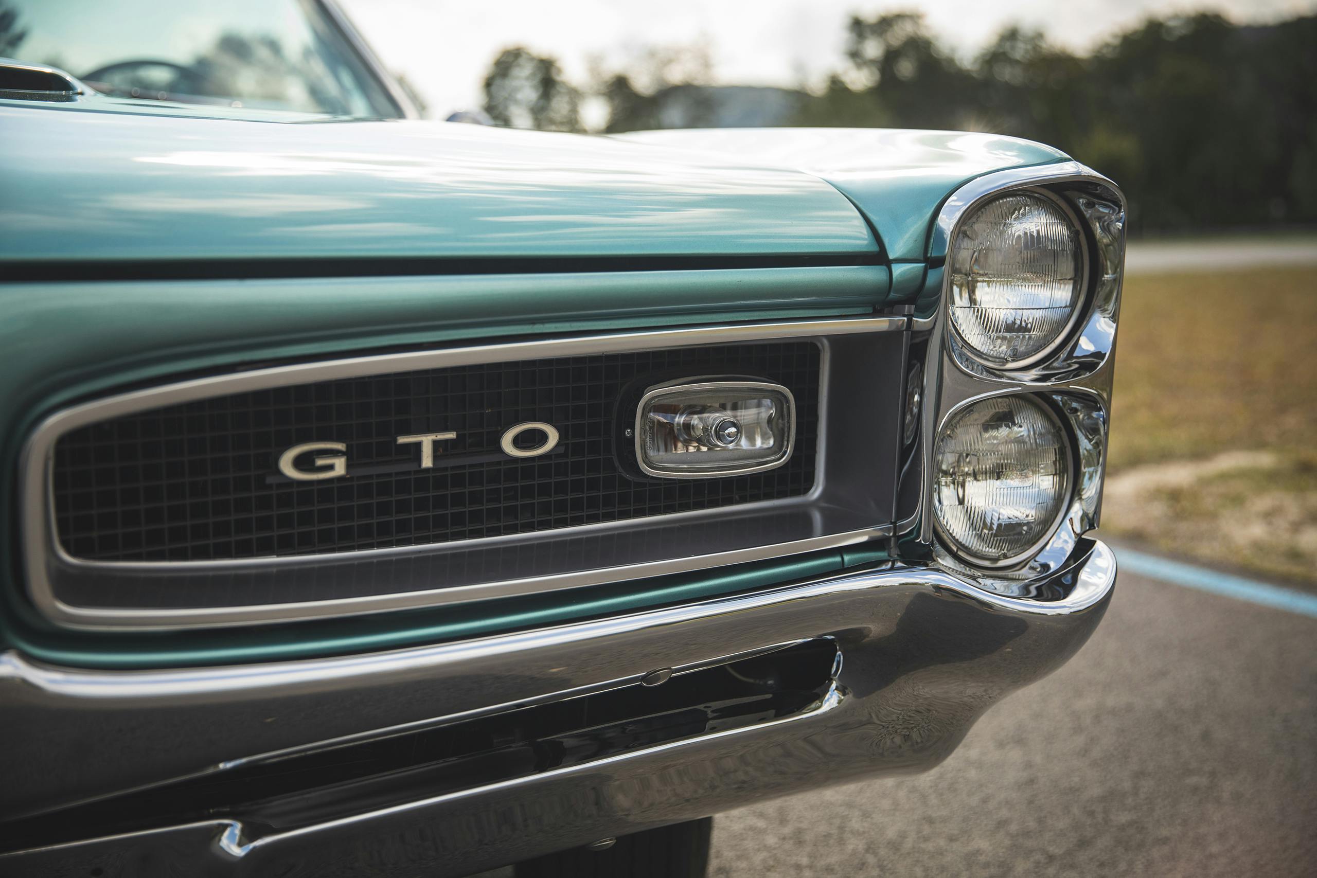 1966 Pontiac GTO grille badge headlight detail