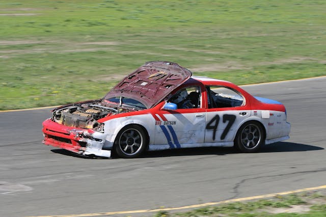 hood flies open at 24 Hours of Lemons