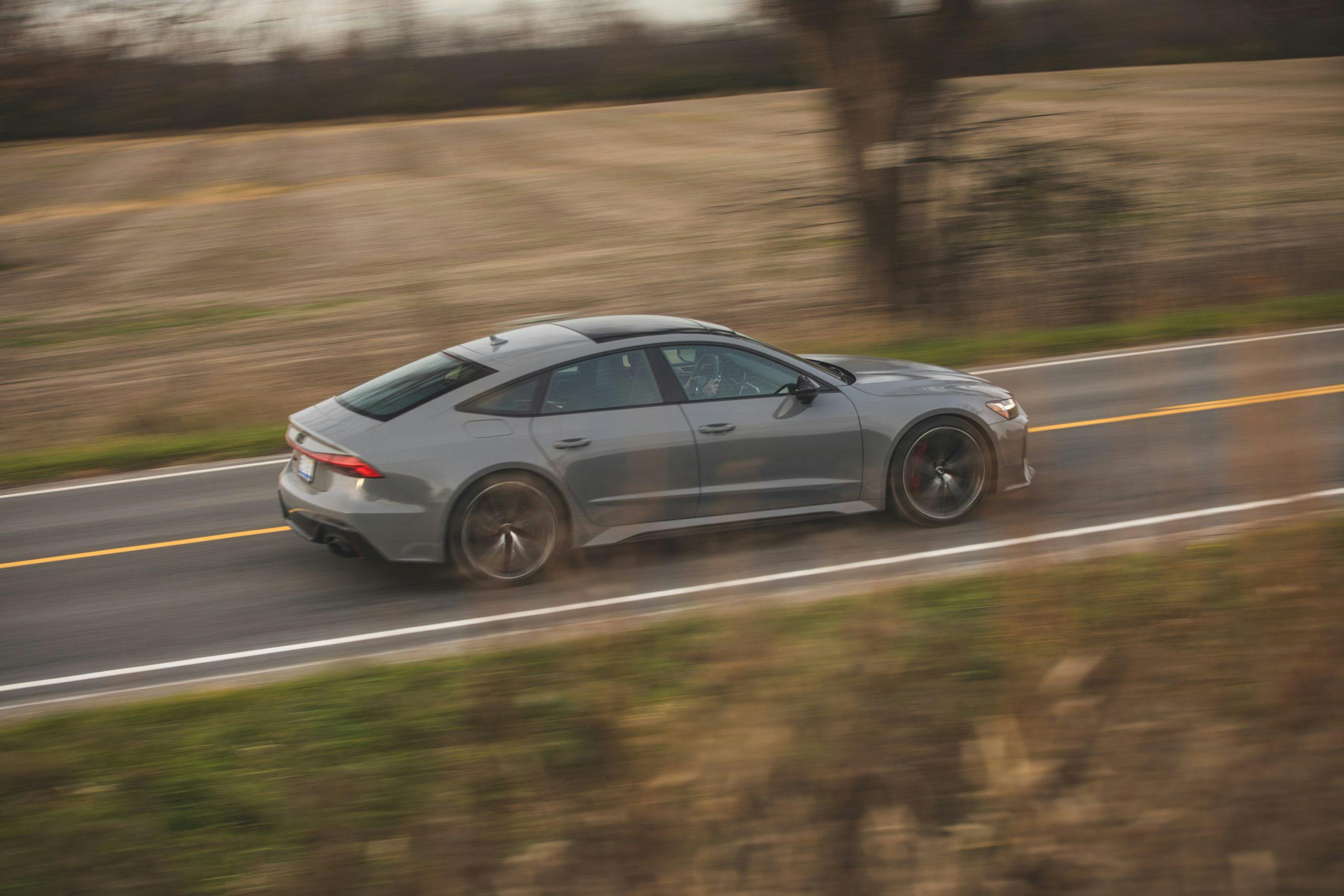 2021 Audi RS 7 rear three-quarter driving action high angle