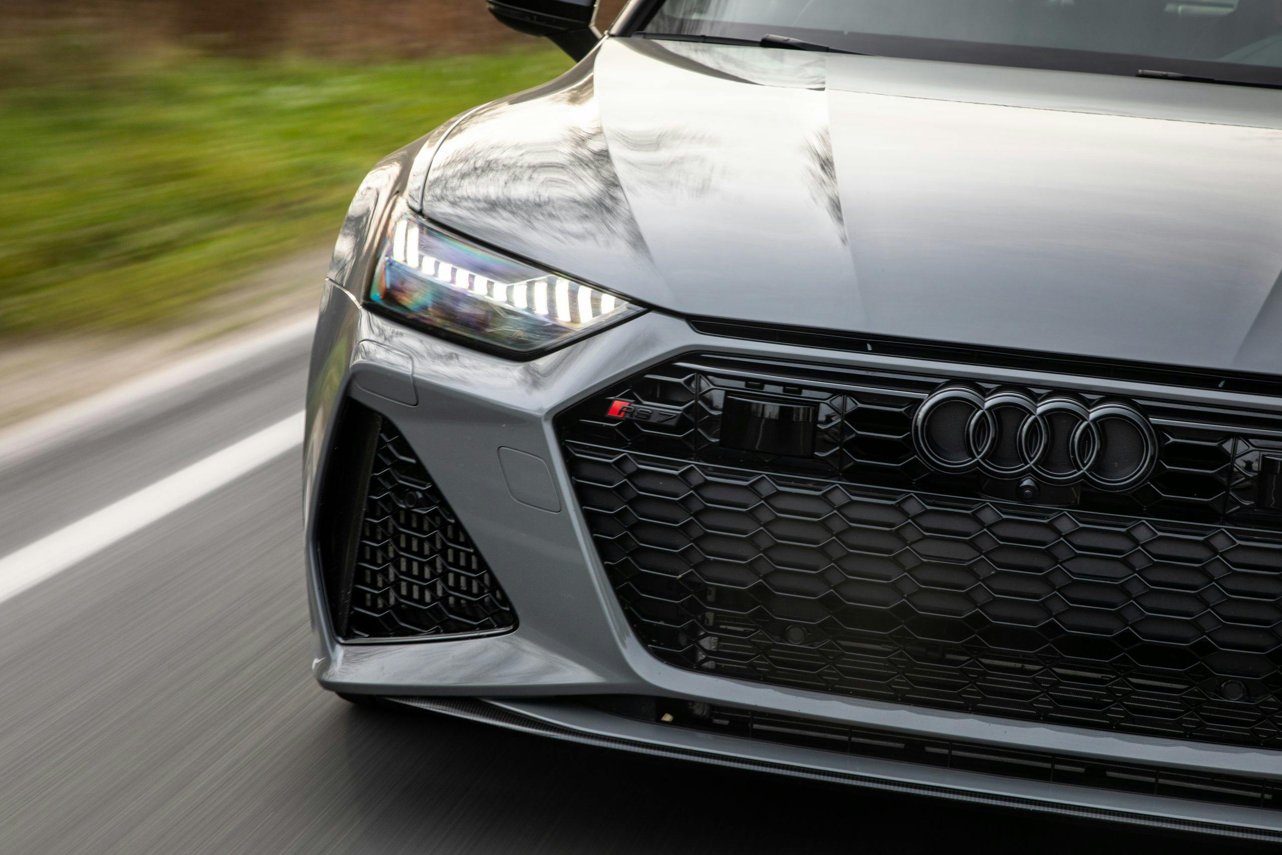 2021 Audi RS 7 front headlight grille close driving action