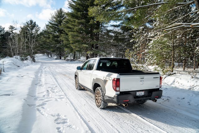 2021 Honda Ridgeline AWD Sport high rear three quarter snowy road