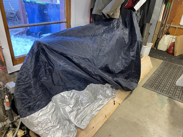 SV650 motorcycle under cover