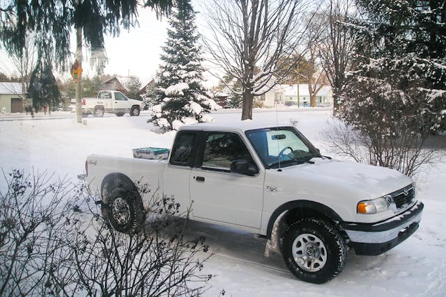 white mazda pickup front three-quarter winter