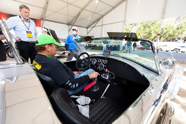 Mecum green hat driver behind wheel