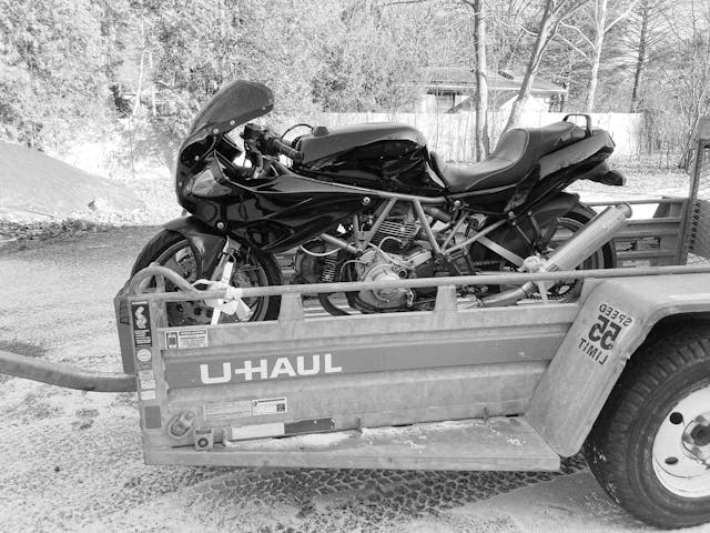 motorcycle uhaul trailer black and white