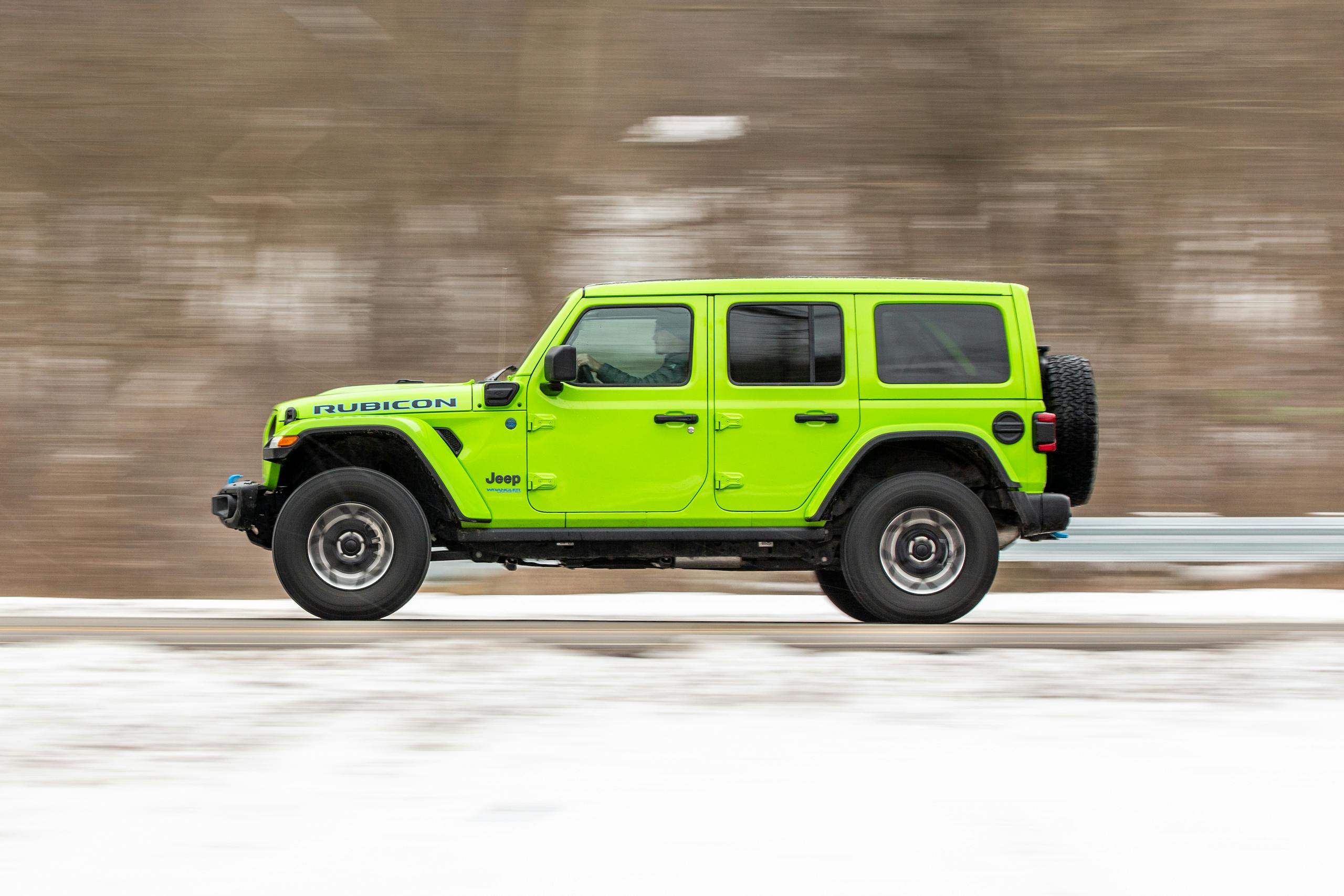 2022 Jeep Wrangler 4XE side profile driving action