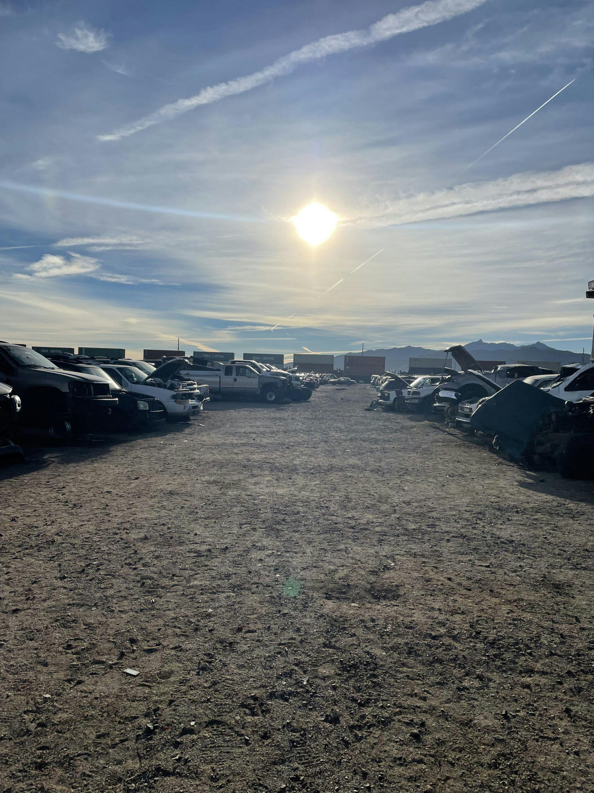 Arizona junkyard sun sky vertical