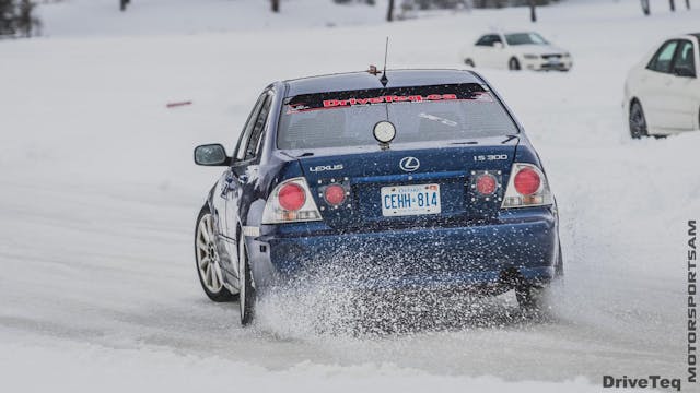Lexus kicks up snow in an ice race