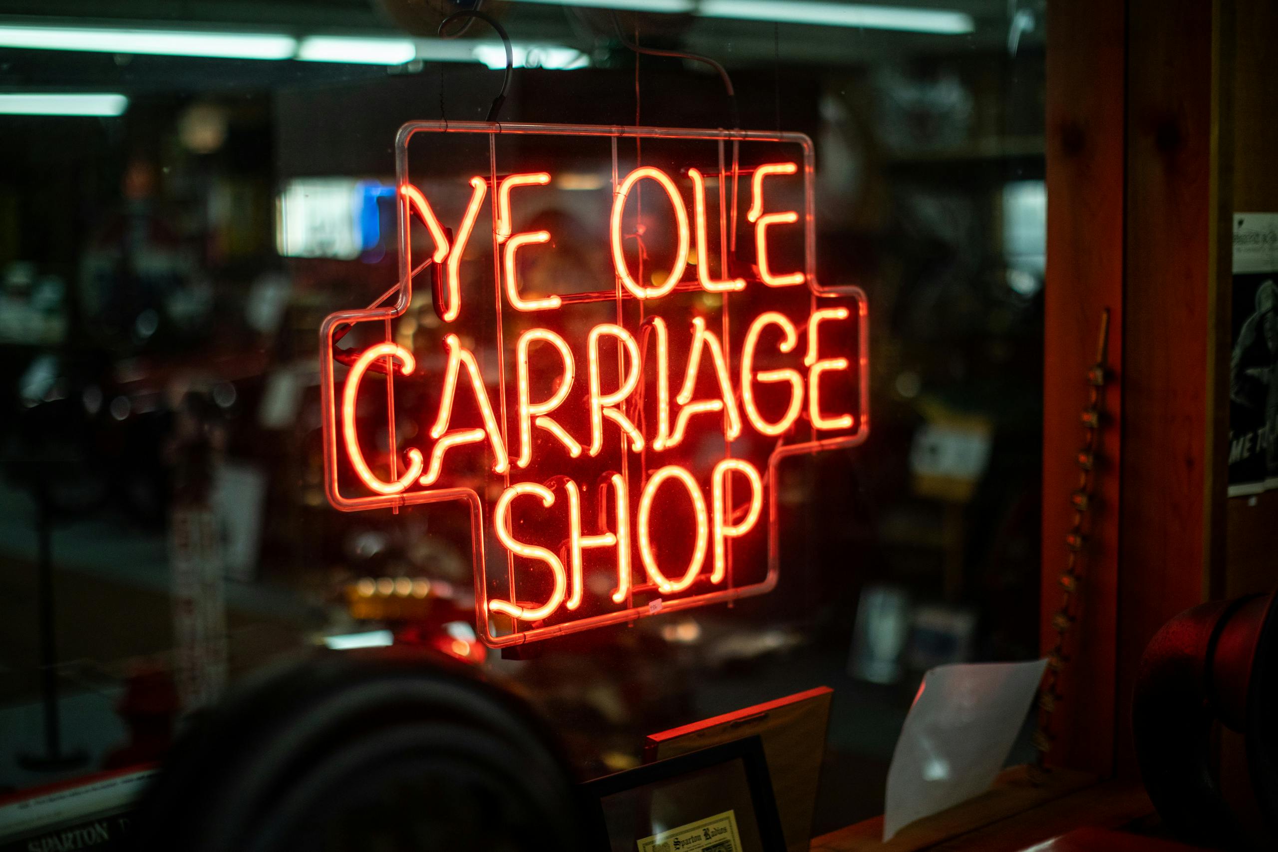 Ye Olde Carriage Shop neon sign