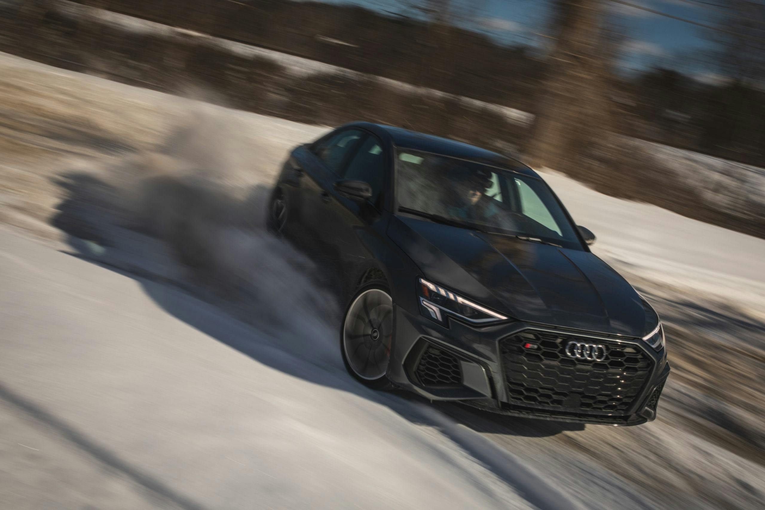 2022 Audi S3 dynamic driving action high angle front three-quarter