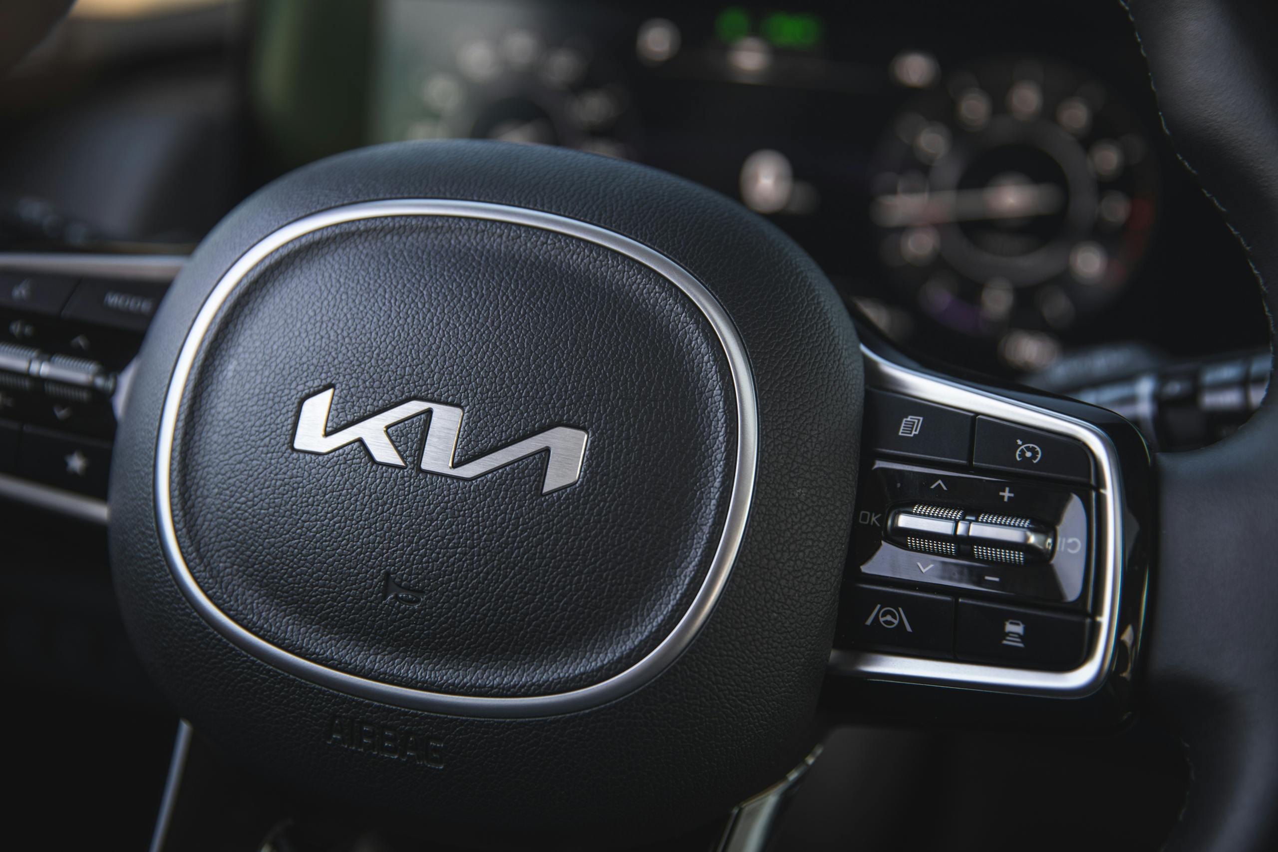 2022 Kia Carnival interior steering wheel closeup detail