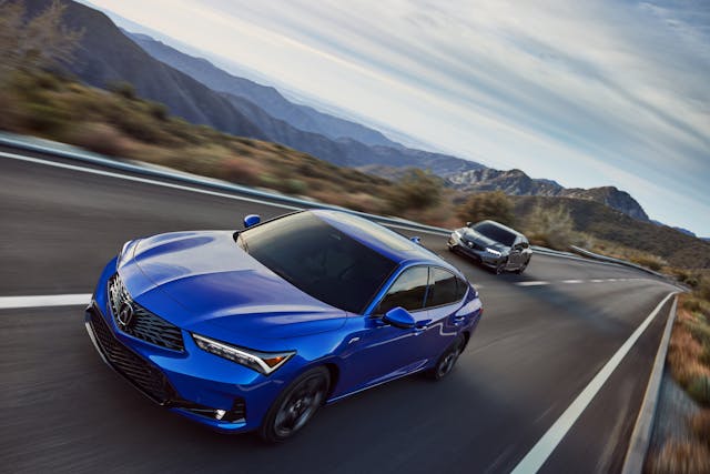 2023 Acura Integra exterior blue and silver driving shots