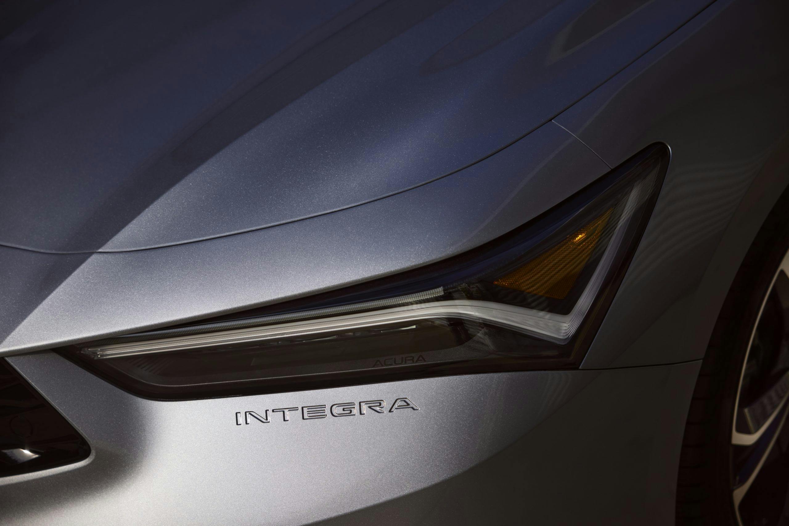 2023 Acura Integra embossed Integra nameplate and front headlamp