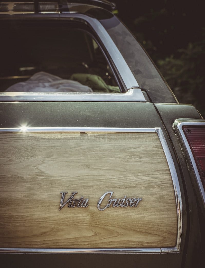 1968 Oldsmobile Vista Cruiser rear door lettering badge