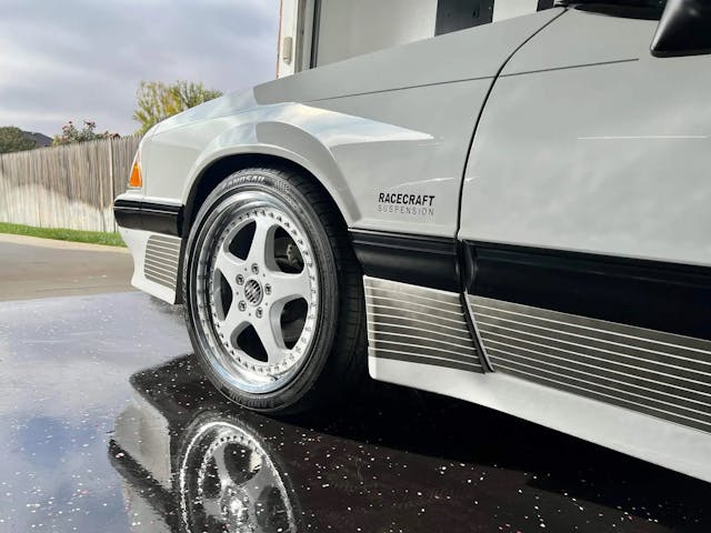 1989 Ford Mustang Saleen convertible front wheel tire quarter reflection