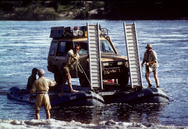 1993 Camel Trophy river tug crossing