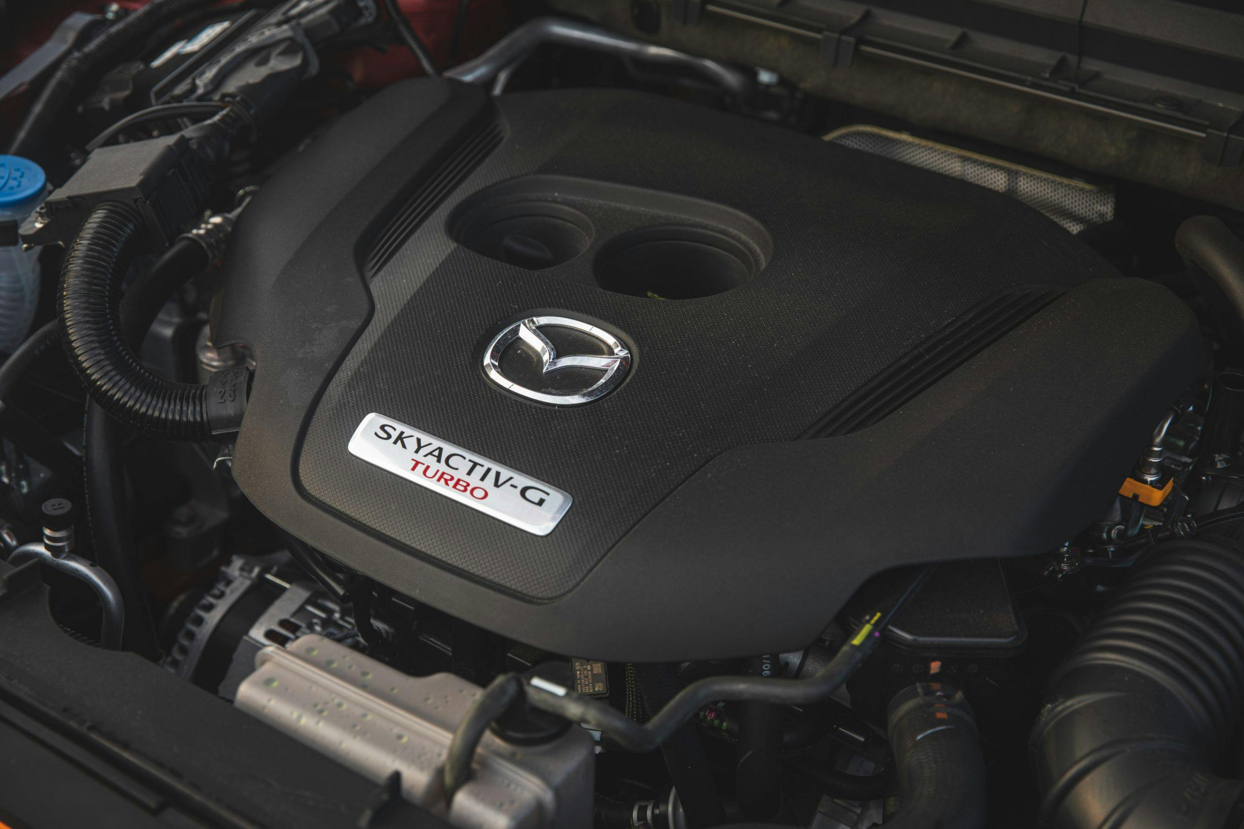 2022 Mazda CX-5 Turbo AWD interior engine cover closeup