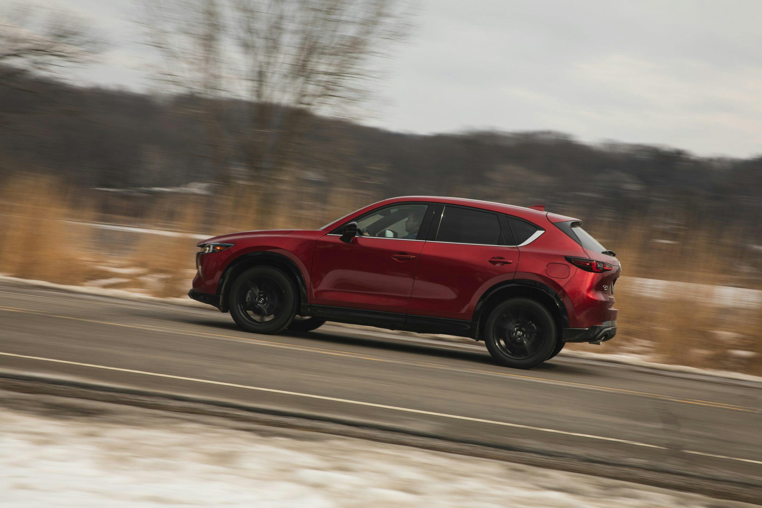 2022 Mazda CX-5 Turbo AWD side view driving action