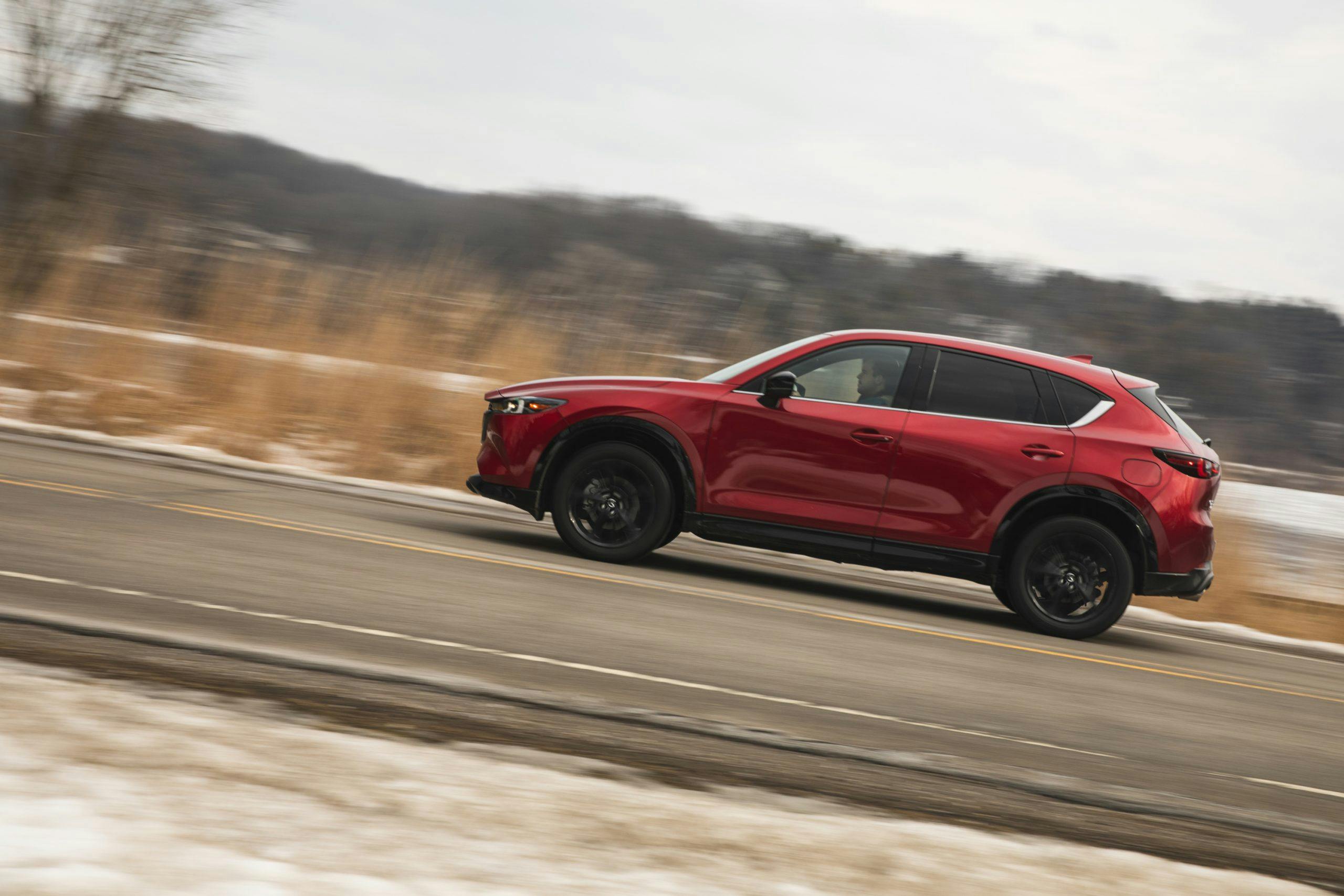 2022 Mazda CX-5 Turbo AWD side view driving action