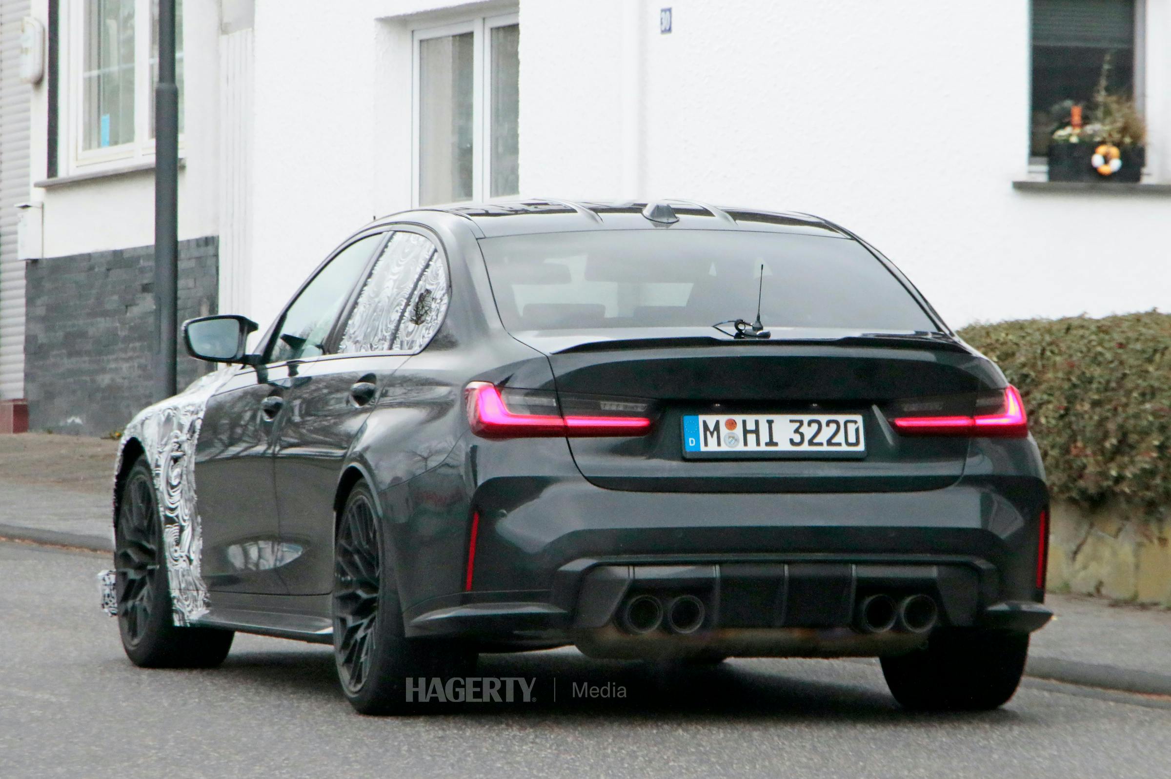 BMW M3 CS spied rear three-quarter