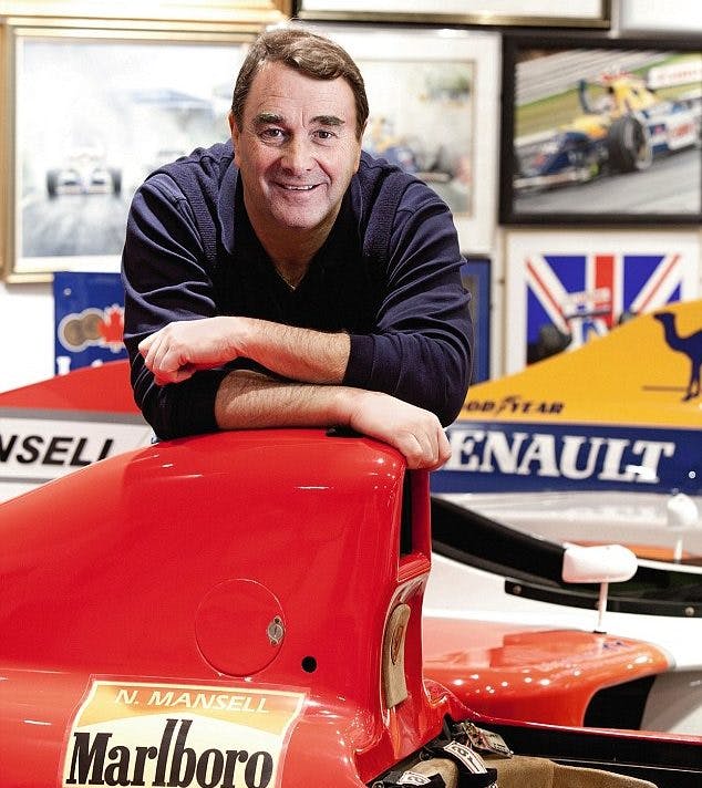 Mansell pictured with his Ferrari and Williams in 2018
