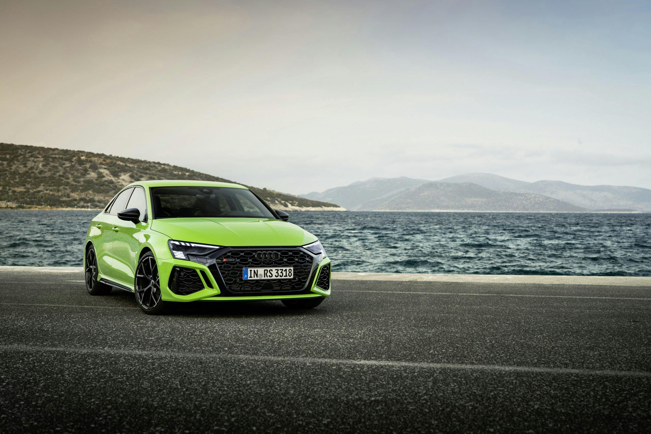 2022 Audi RS3 Sedan Exterior Kyalami Green Front three quarter parked