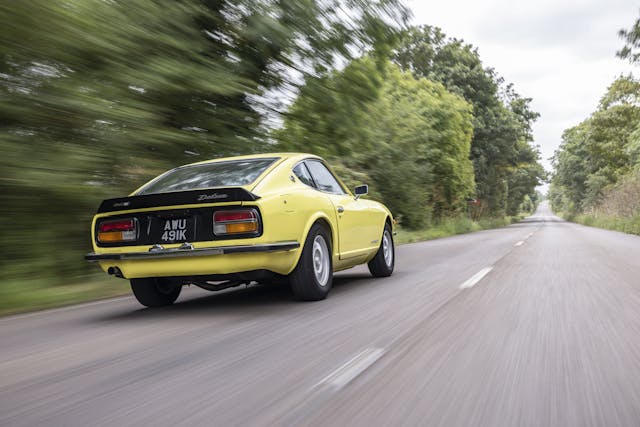 Datsun 240Z rear three-quarter driving action