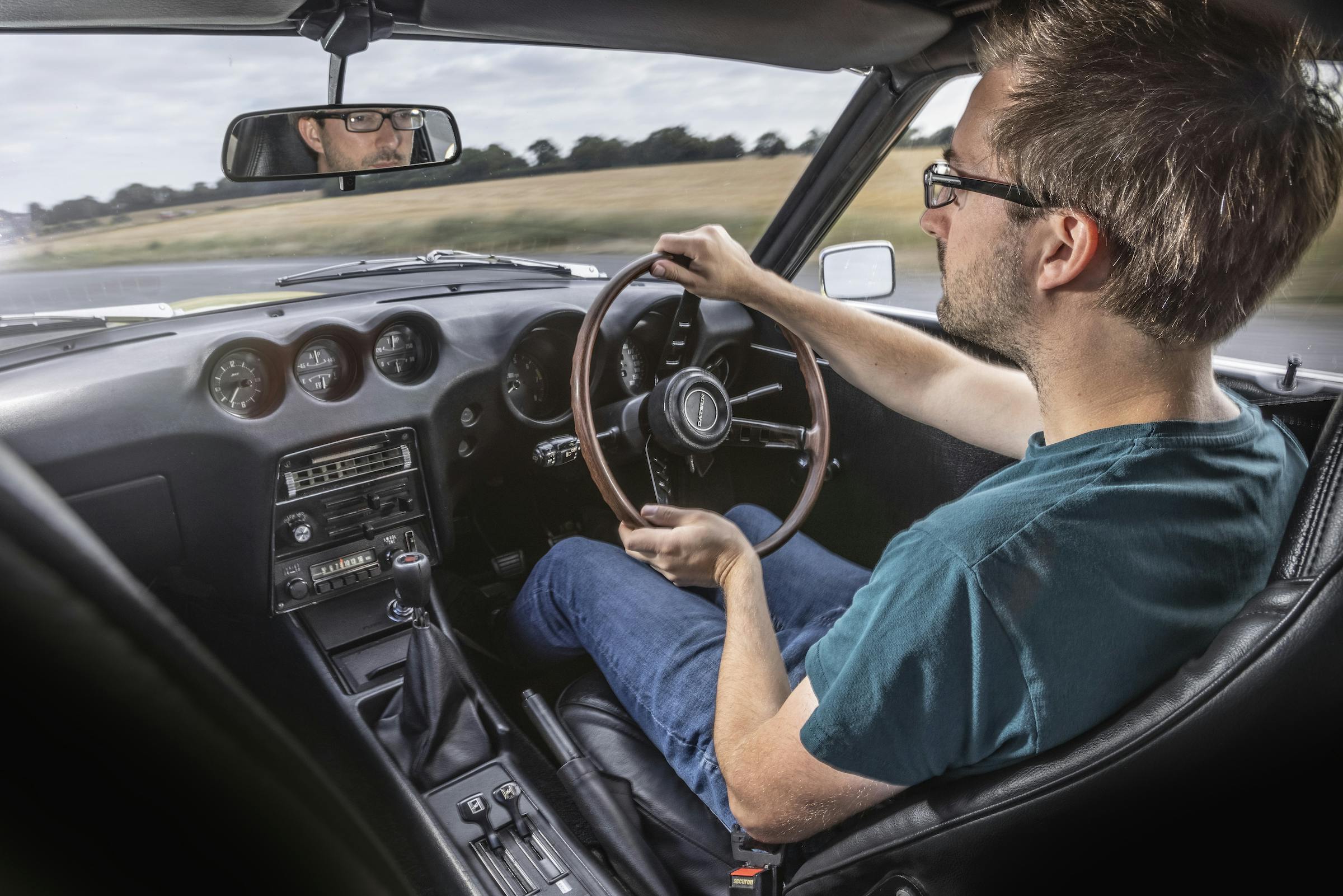 Datsun 240Z interior cockpit RHD driving action