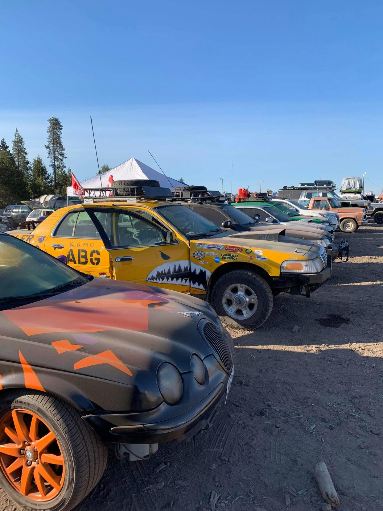 Dusty off-roading vehicles meet for the Gambler 500
