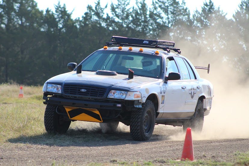 Ford off-roader leans as it rounds corner at HooptieX