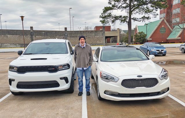 Joe Schreiber and his new Dodge and old Kia K900