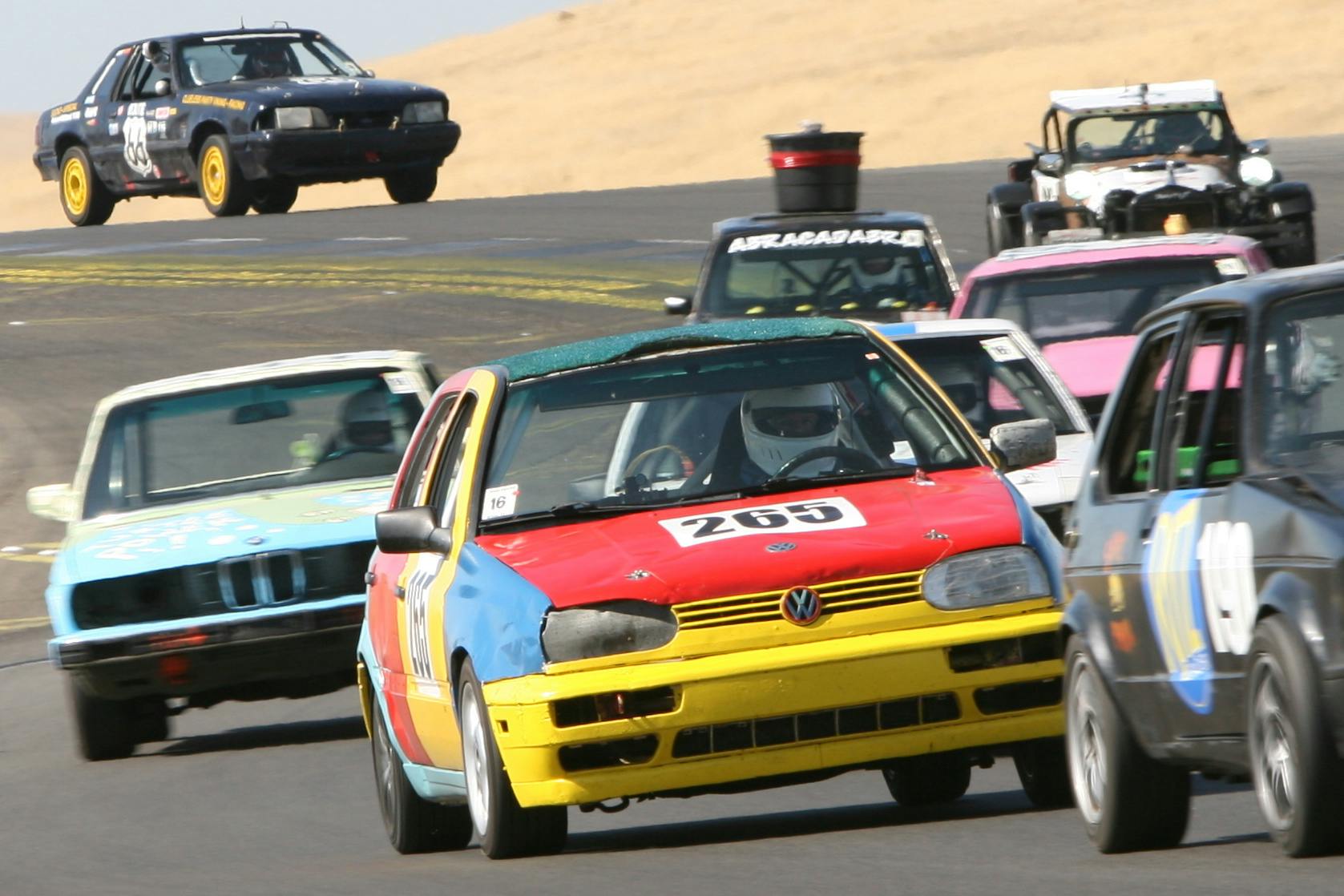 Cars round the track in the 24 Hours of Lemons