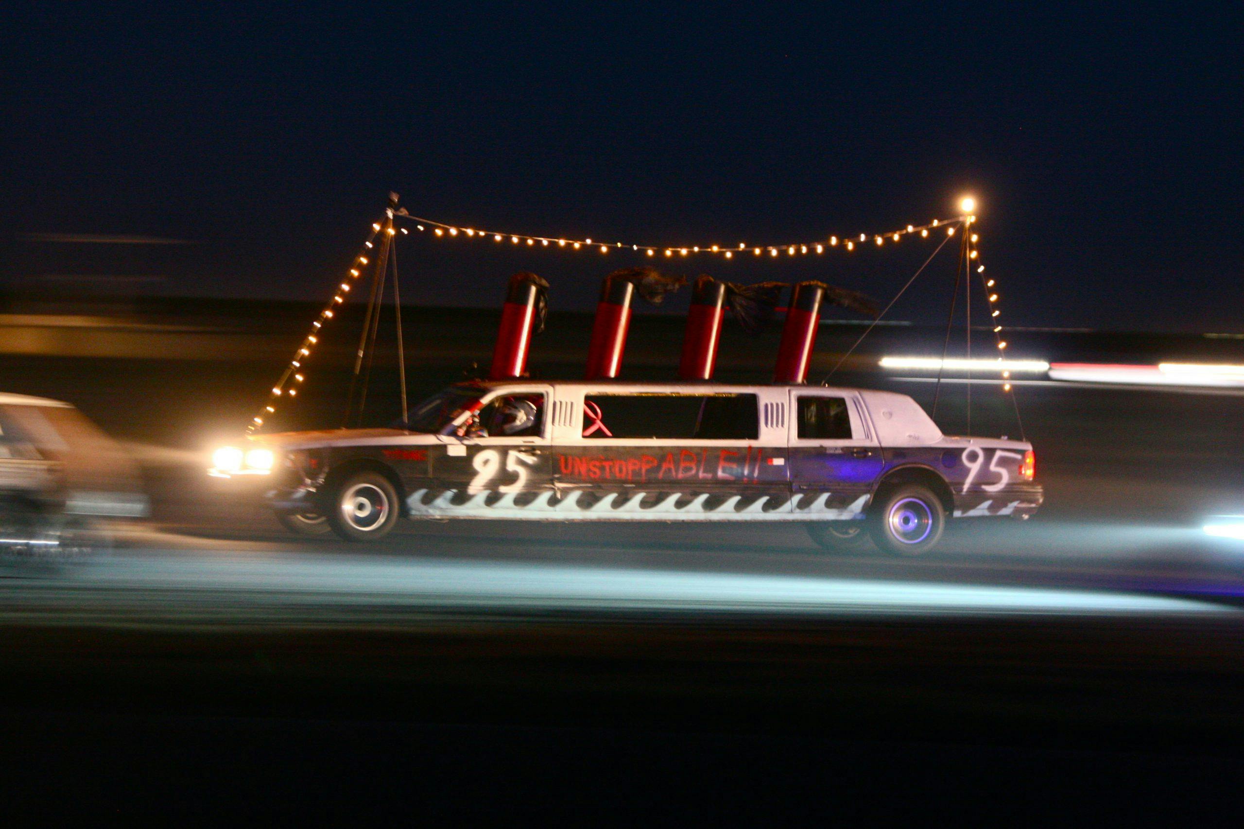 Limousine decorated as a boat races in the 24 Hours of Lemons