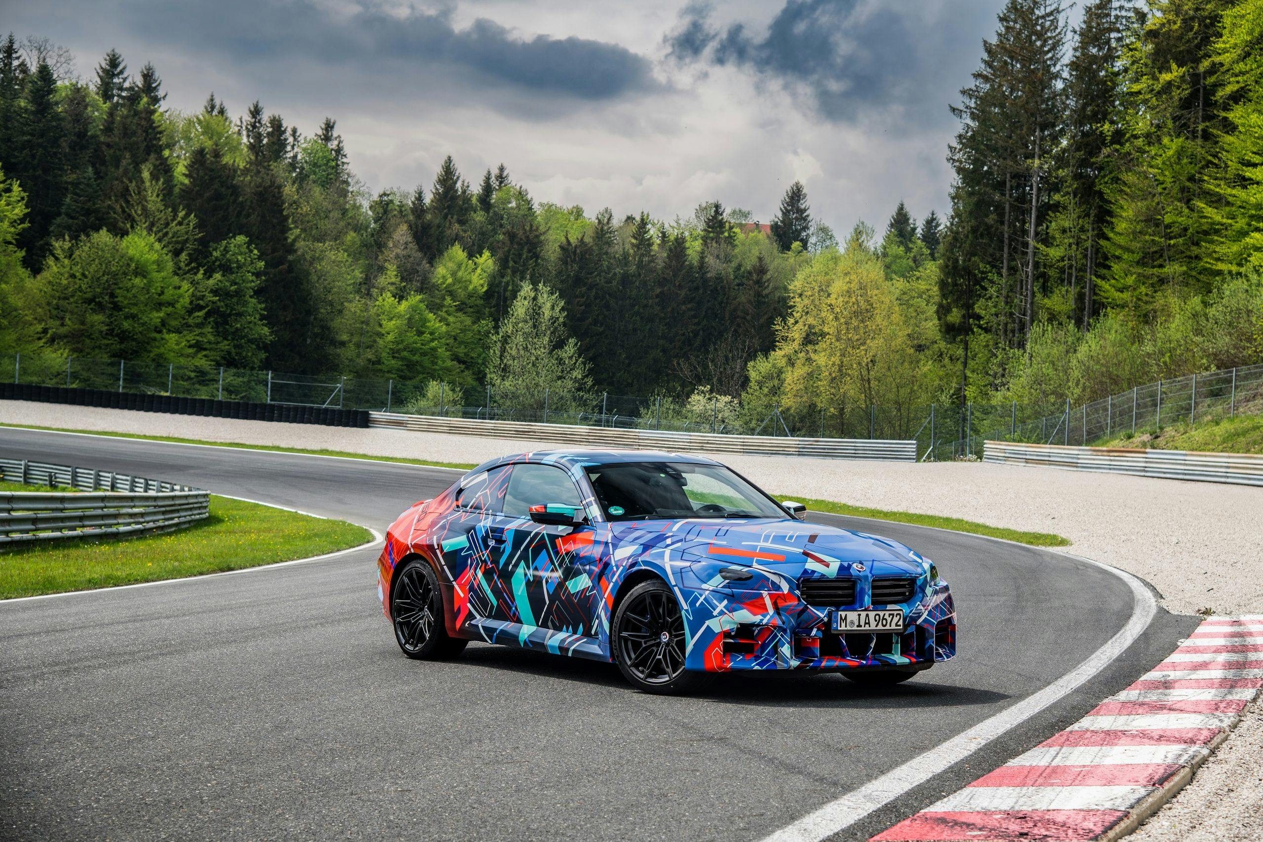 Next-generation BMW M2 exterior parked on track front three quarter