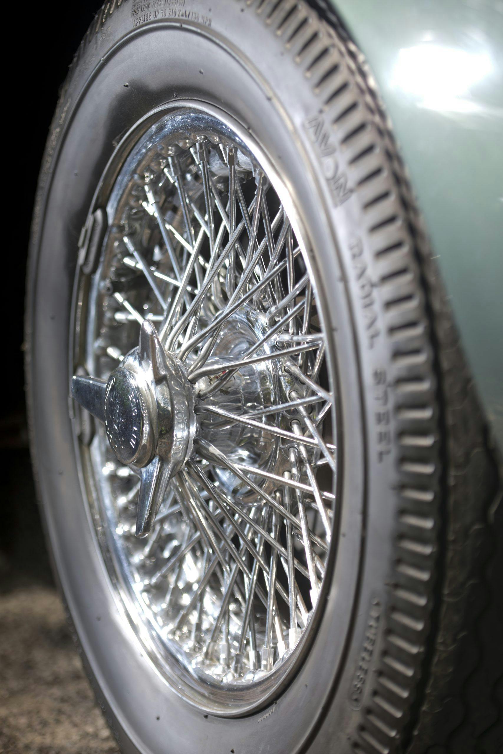Aston Martin DB4 wheel tire closeup vertical