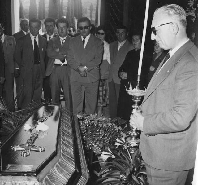 Enzo Ferrari attends De Portago Funeral