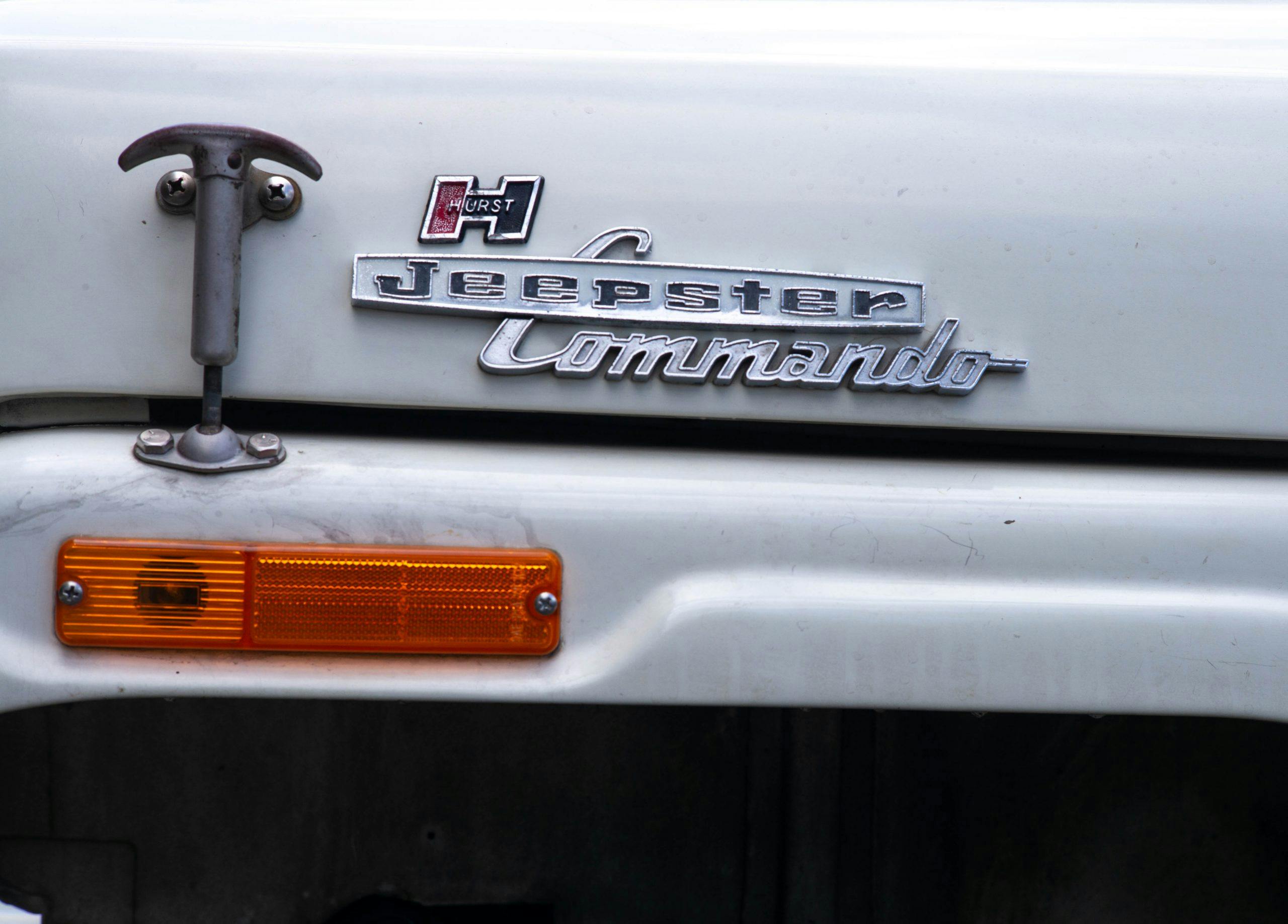 1971 Jeepster Commando badges