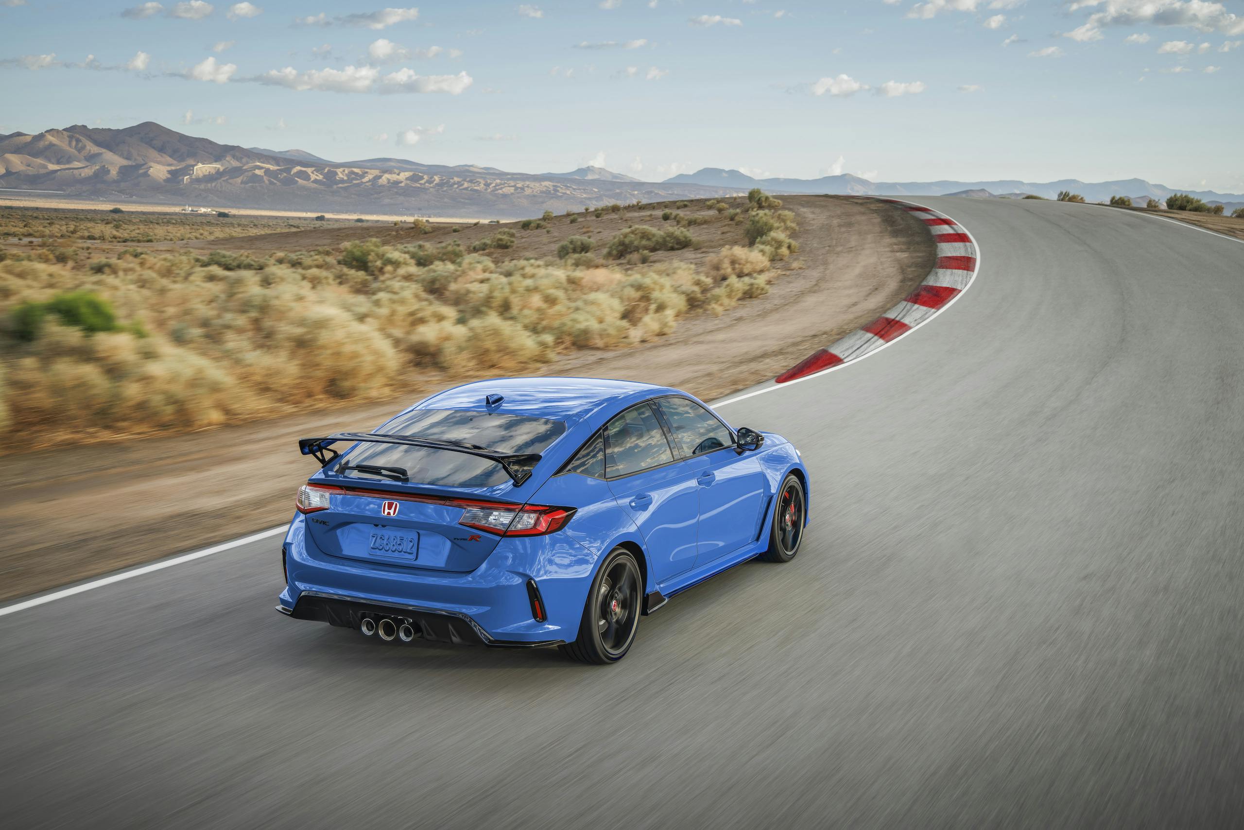 2023 Honda Civic Type R blue high angle driving action