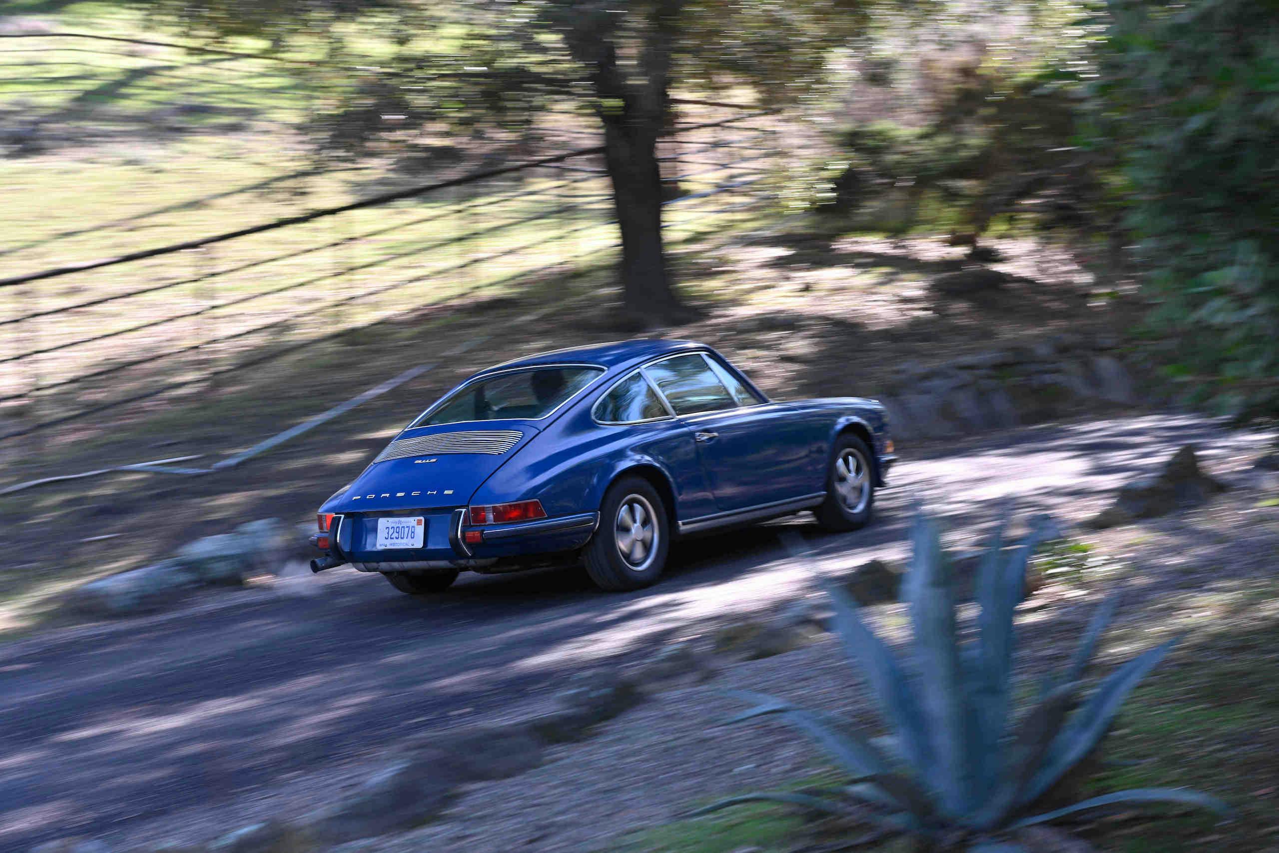 Porsche 911E action rear three-quarter