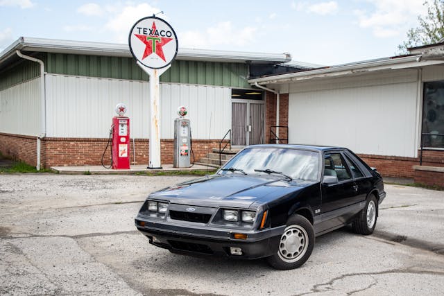 Ford Mustang at Texaco station front three-quarter