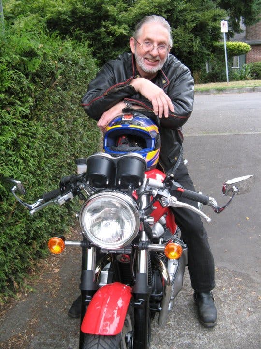 Paul Duchene on motorcycle