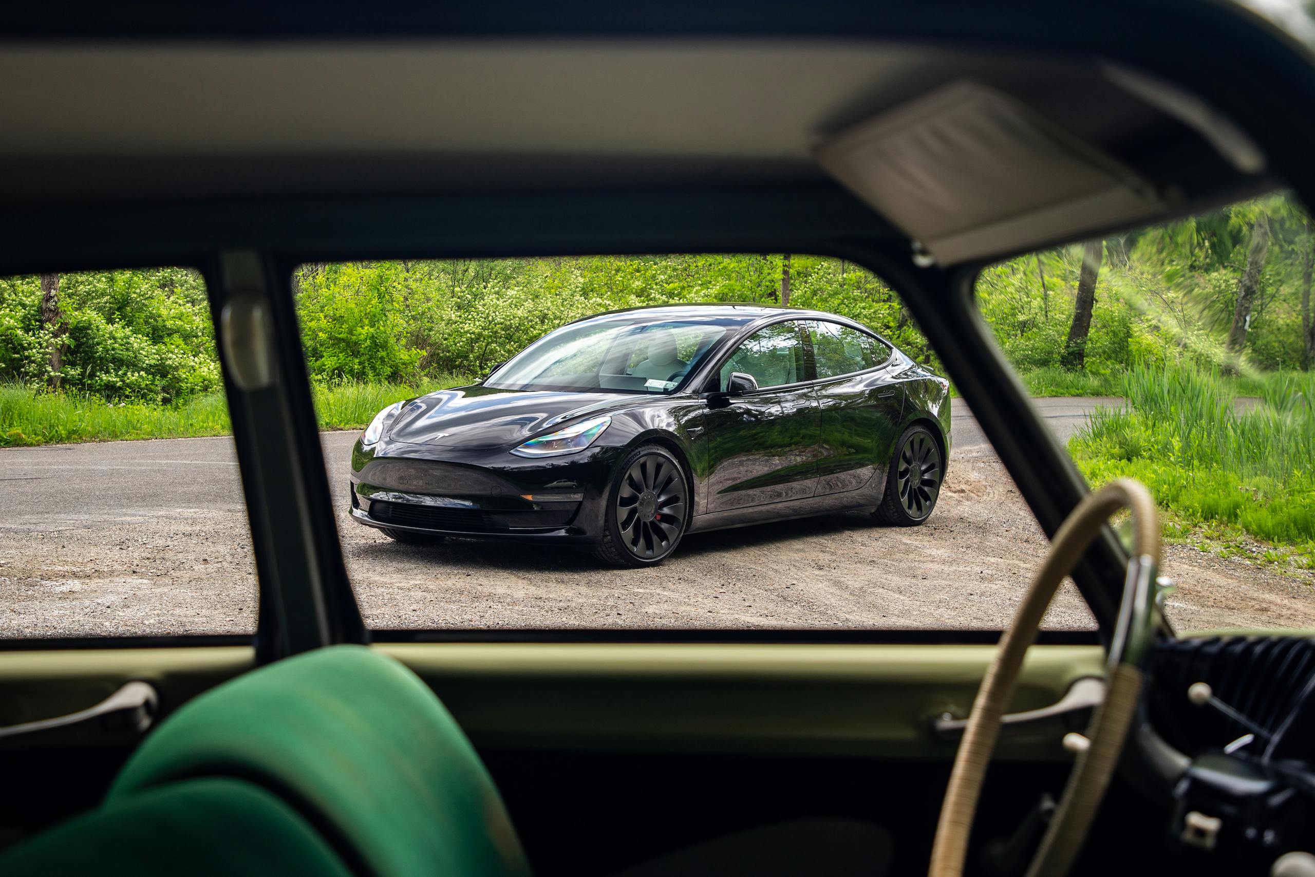 2021 Tesla Model 3 Performance through Citroen DS window